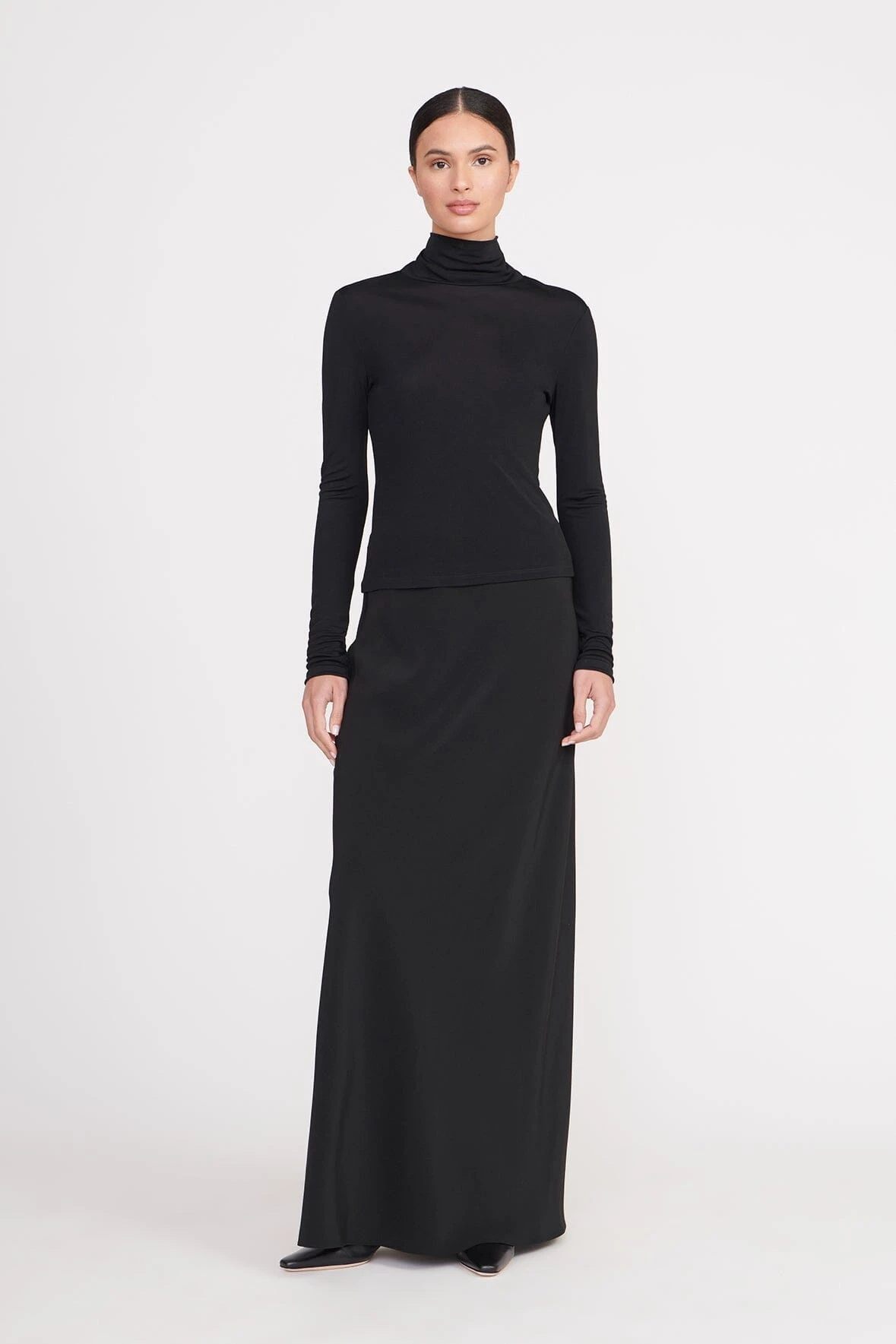 Elevate Your 2025 Wardrobe: Timeless Pieces That Transcend Trends -Outlet Attirion Store tura skirt black 1